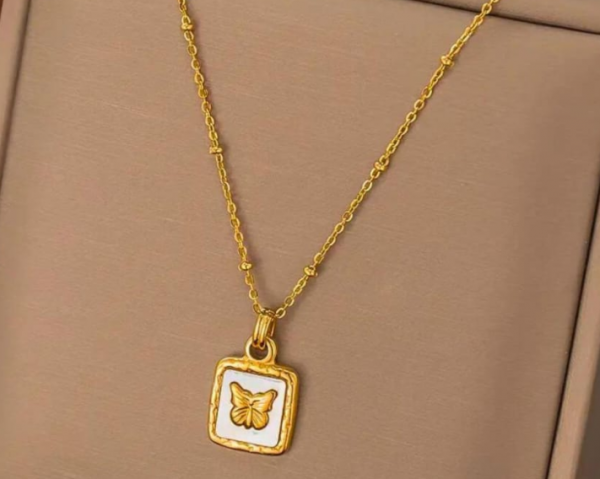Butterfly Strudded in Shell Square Necklace